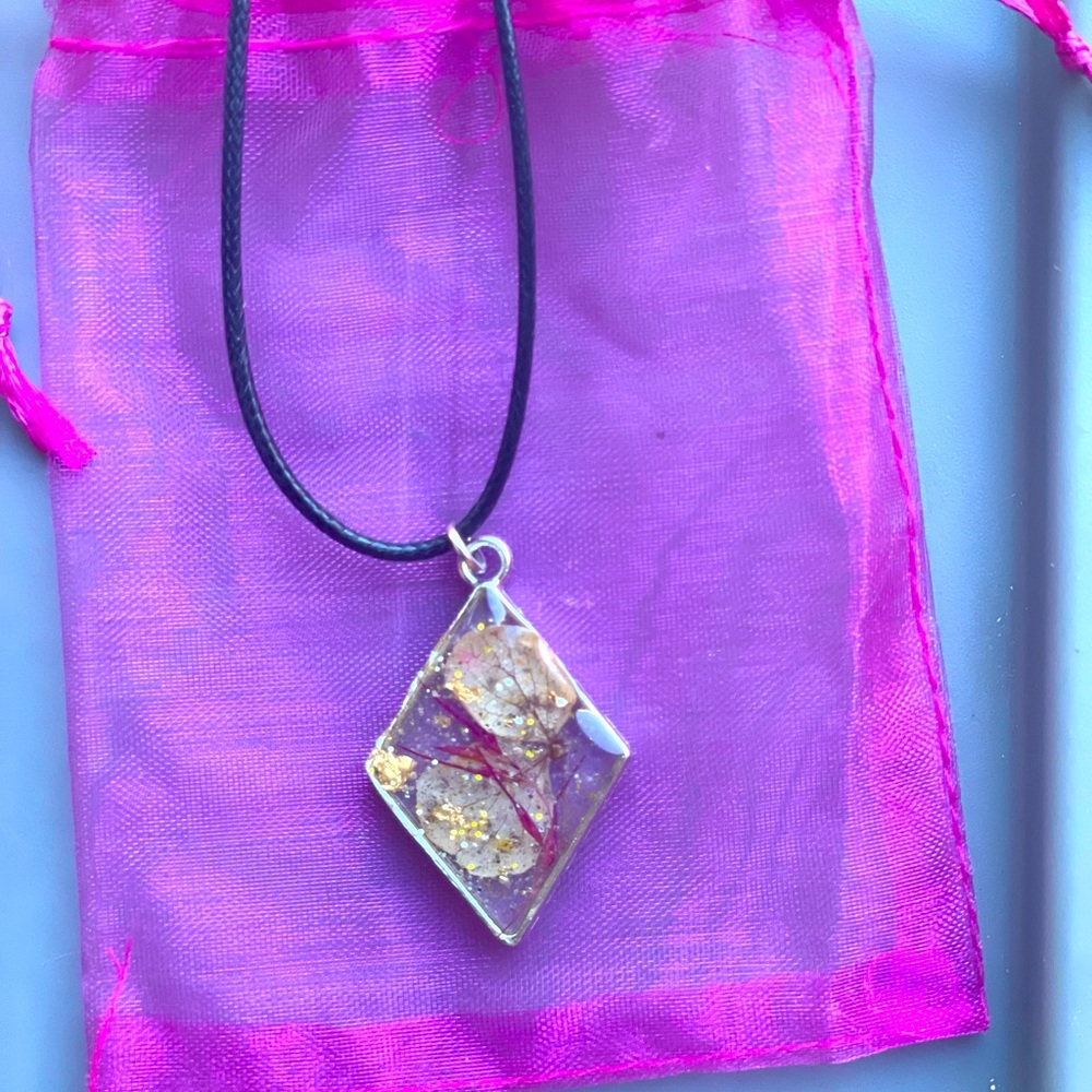 Handmade Floral and Celestial Epoxy Resin Pendants!
